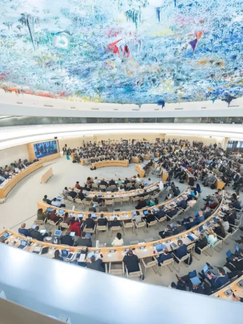Birds eye view of the large meeting room in the UN Palais des Nations