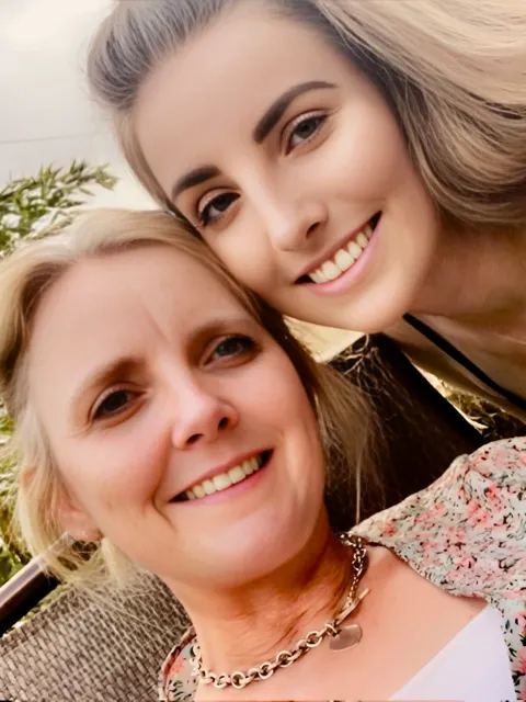 Blond White woman with teenage daughter