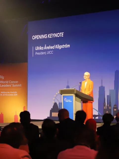 Wide angle shot of speaker at a podium