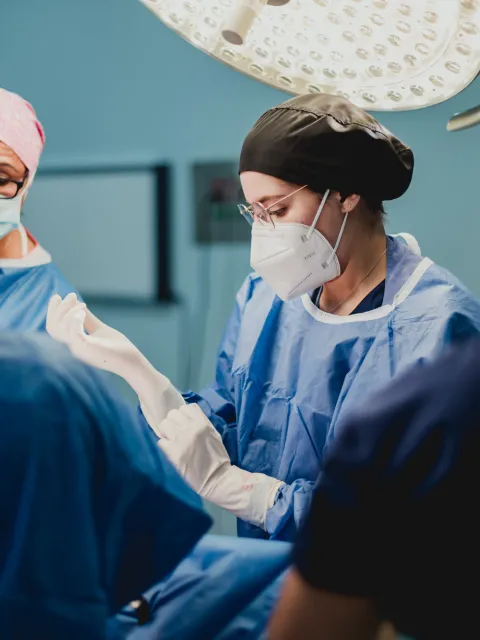 Doctors around an operating table