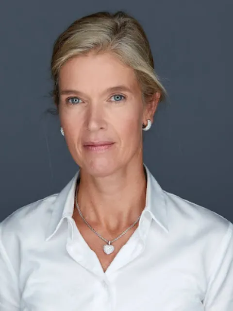 Headshot white middle-aged woman with blond hair