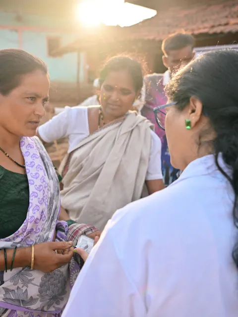 Female doctor is explaining the appropriate medication dosage to a woman