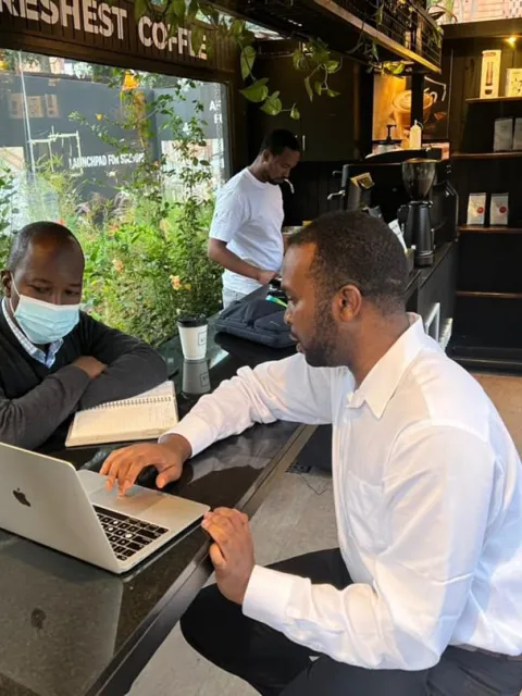 UICC alumni Young Leaders, Dr Kingsley I. Ndoh, Founder and Chief Strategist of Hurone AI, and Dr Francois Uwinkindi, Non-Communicable Diseases Division Manager at Rwanda Biomedical Center, which is helping deploy a test version of the health app Guzika in Rwanda.