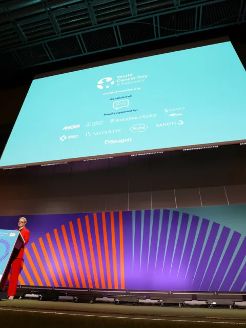 UICC President Elect Ulrike Årehed Kågström speaks at a plenary session at the World Cancer Congress 2022 in front of a giant backscreen