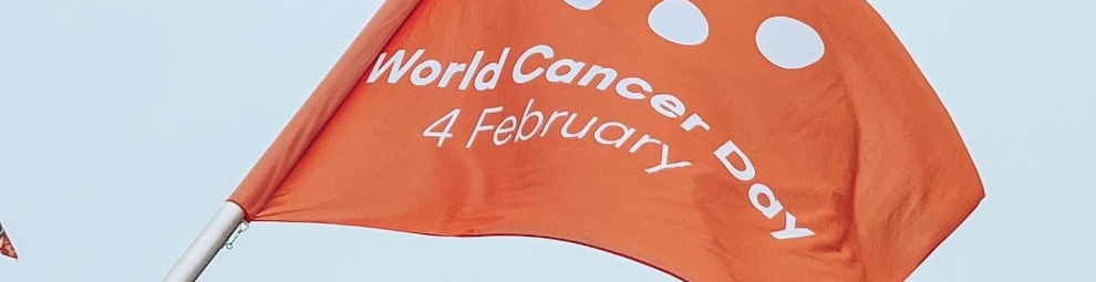 World Cancer Day flag flying on the Mont Blanc Bridge in Geneva, Switzerland, where UICC is headquarted