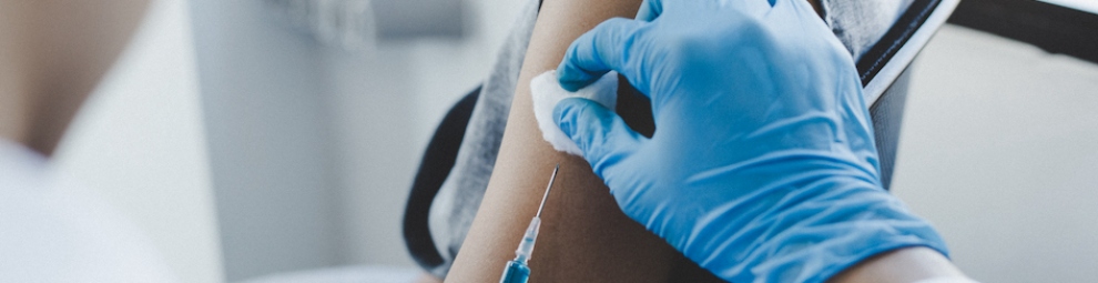Woman receiving a vaccine shot