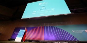 UICC President Elect Ulrike Årehed Kågström speaks at a plenary session at the World Cancer Congress 2022 in front of a giant backscreen