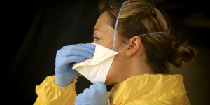 Masked health worker - Cancer care and coronavirus